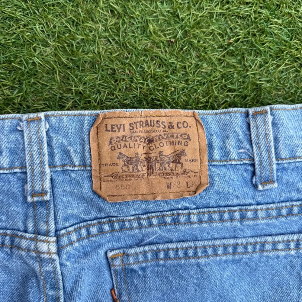 Vintage Levis 550 Relaxed Fit Tapered Leg Jeans Light Wash Made in USA 38x34